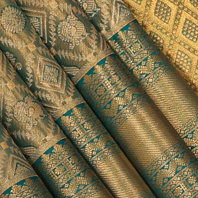 Kanchipattu An Ethereal Gold/Teal Blue Saree