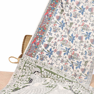 White village-theme machine-print kalamkari cotton saree, contrast floral creeper & peacock border & human figurines pallu