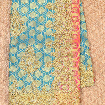 Blue embossed silksaree with stonework, contrast cutwork border & rich stonework pallu & unstitched aari blouse