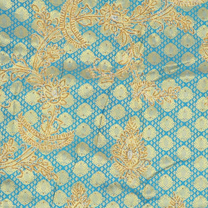 Blue embossed silksaree with stonework, contrast cutwork border & rich stonework pallu & unstitched aari blouse