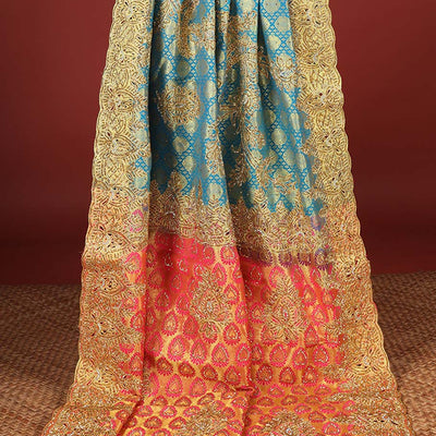Blue embossed silksaree with stonework, contrast cutwork border & rich stonework pallu & unstitched aari blouse