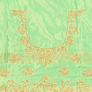 Green silk saree of ogee design with stonework, self curve border of peacock design & grand pallu embedded with stones
