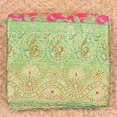 Hot pink silksaree with floral & paisley jacquard design, contrast turquoise cut work border & pallu, all-over stonework
