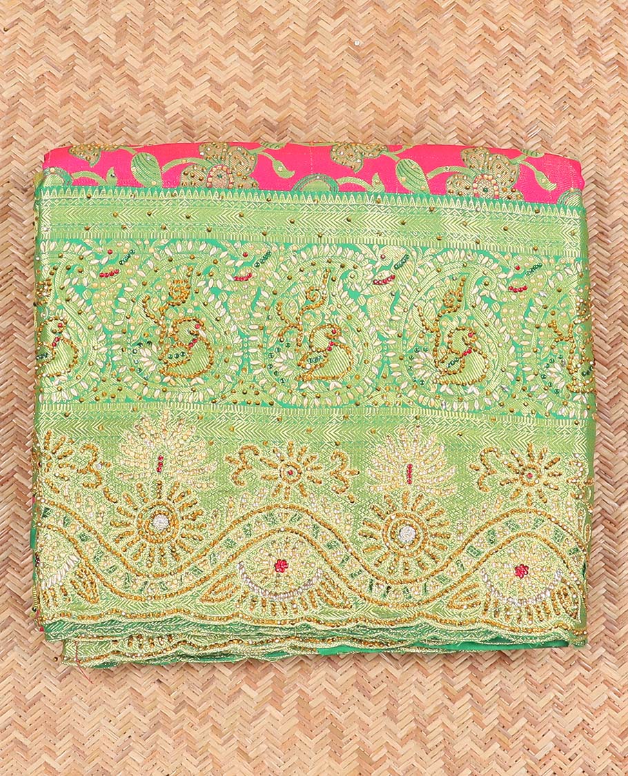 Hot pink silksaree with floral & paisley jacquard design, contrast turquoise cut work border & pallu, all-over stonework