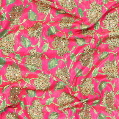 Hot pink silksaree with floral & paisley jacquard design, contrast turquoise cut work border & pallu, all-over stonework