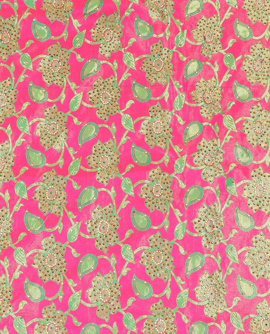 Hot pink silksaree with floral & paisley jacquard design, contrast turquoise cut work border & pallu, all-over stonework