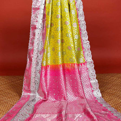 Leaf green silksaree with floral-jaal jacquard, contrast cut work border & pallu of argyle design, all-over stonework
