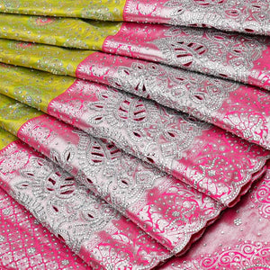 Leaf green silksaree with floral-jaal jacquard, contrast cut work border & pallu of argyle design, all-over stonework