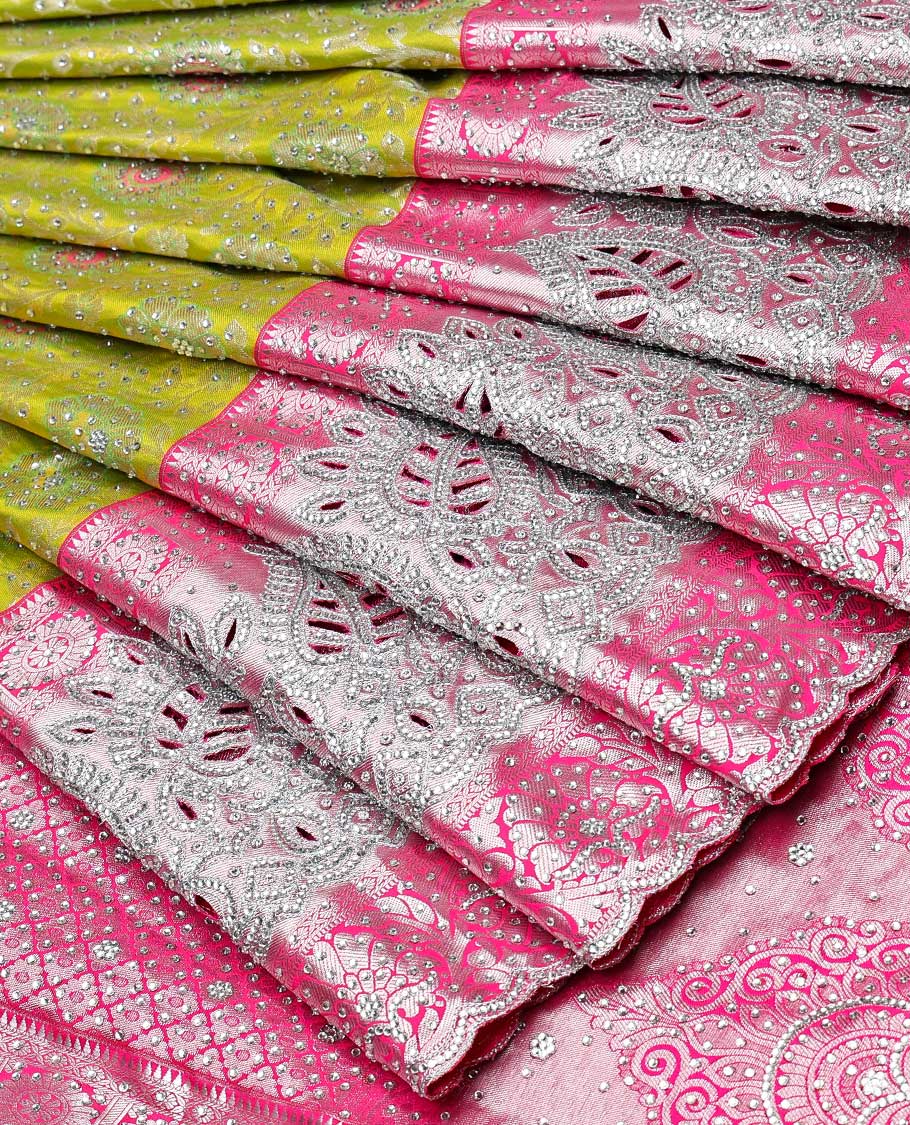 Leaf green silksaree with floral-jaal jacquard, contrast cut work border & pallu of argyle design, all-over stonework