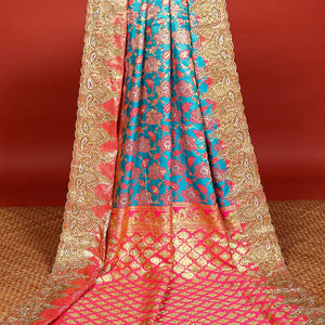 Sky blue floral-jaal jacquard vastrakala silksaree, contrast paisley border & pallu of ogee pattern, all-over stonework