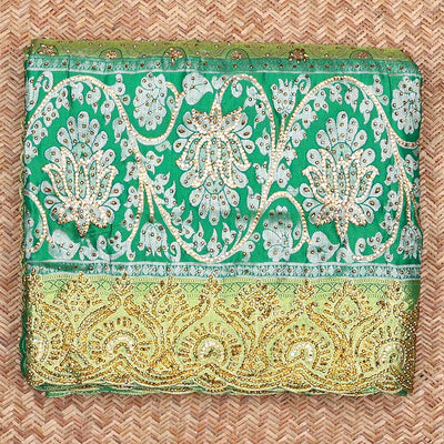 Green ogee jacquard silk saree with stonework,contrast stone & cutwork border & stonework pallu of jaal & paisley