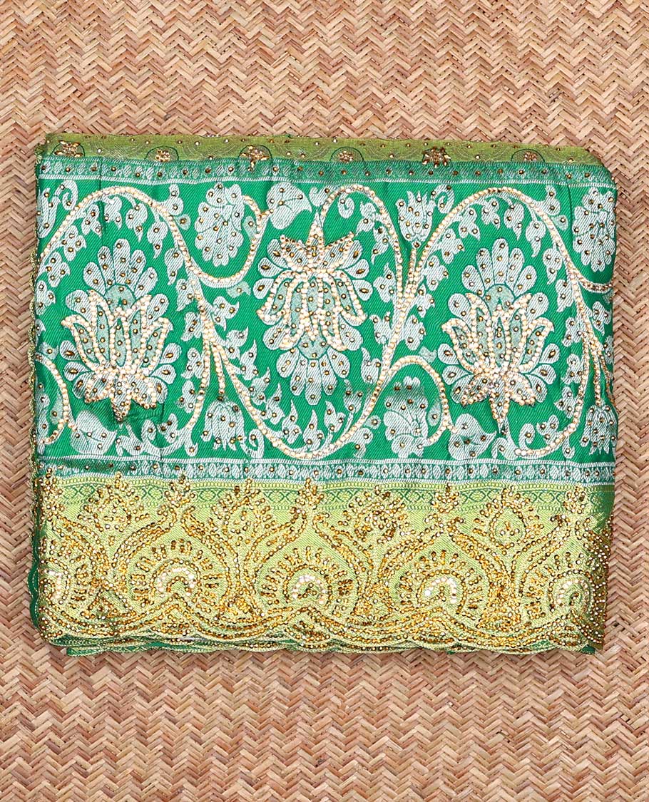 Green ogee jacquard silk saree with stonework,contrast stone & cutwork border & stonework pallu of jaal & paisley