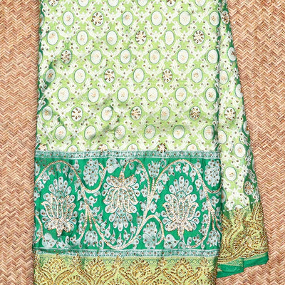 Green ogee jacquard silk saree with stonework,contrast stone & cutwork border & stonework pallu of jaal & paisley