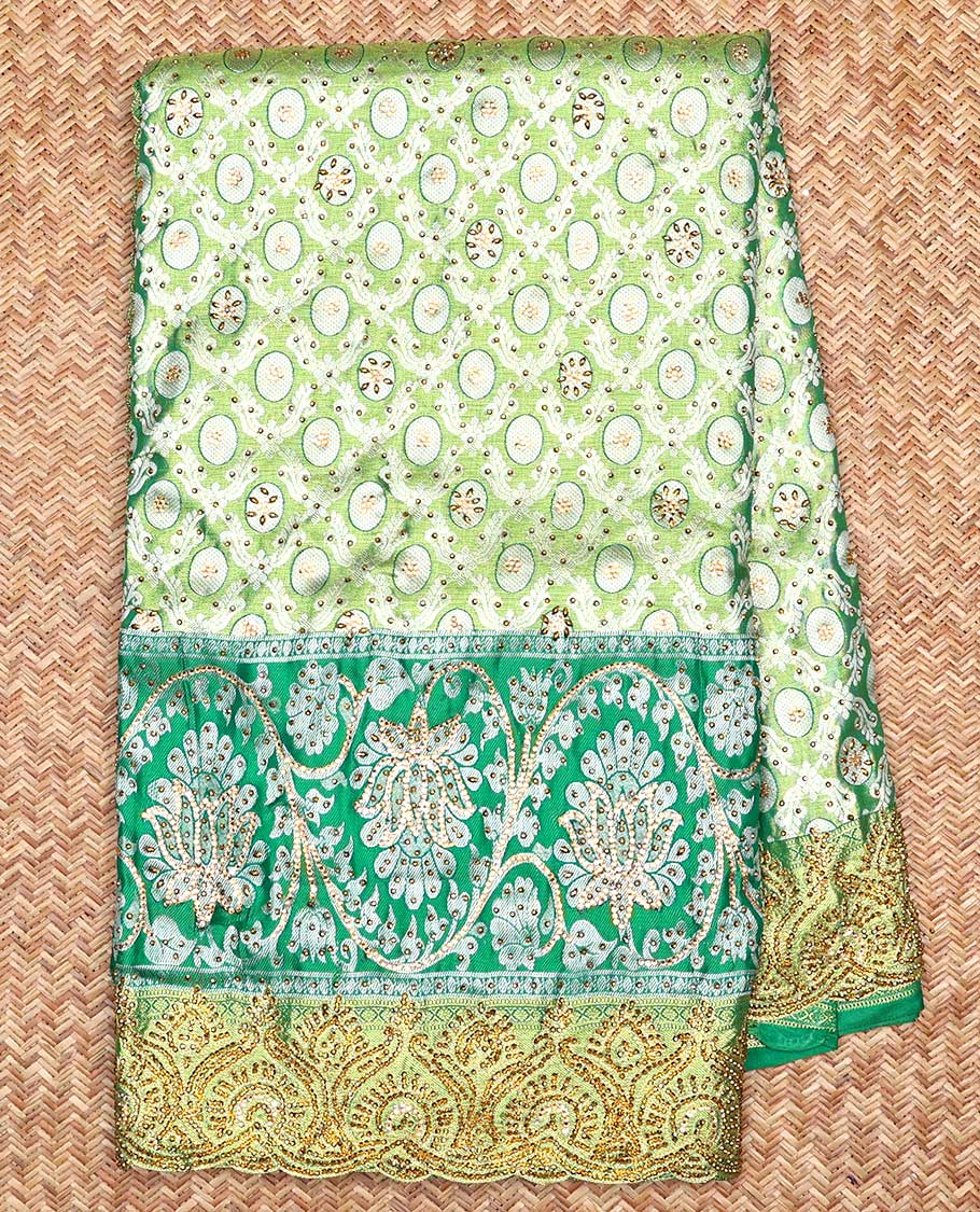 Green ogee jacquard silk saree with stonework,contrast stone & cutwork border & stonework pallu of jaal & paisley