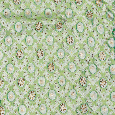 Green ogee jacquard silk saree with stonework,contrast stone & cutwork border & stonework pallu of jaal & paisley