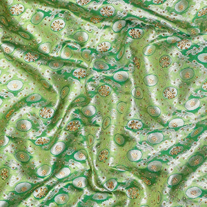 Green ogee jacquard silk saree with stonework,contrast stone & cutwork border & stonework pallu of jaal & paisley