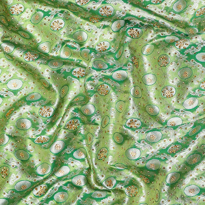 Green ogee jacquard silk saree with stonework,contrast stone & cutwork border & stonework pallu of jaal & paisley