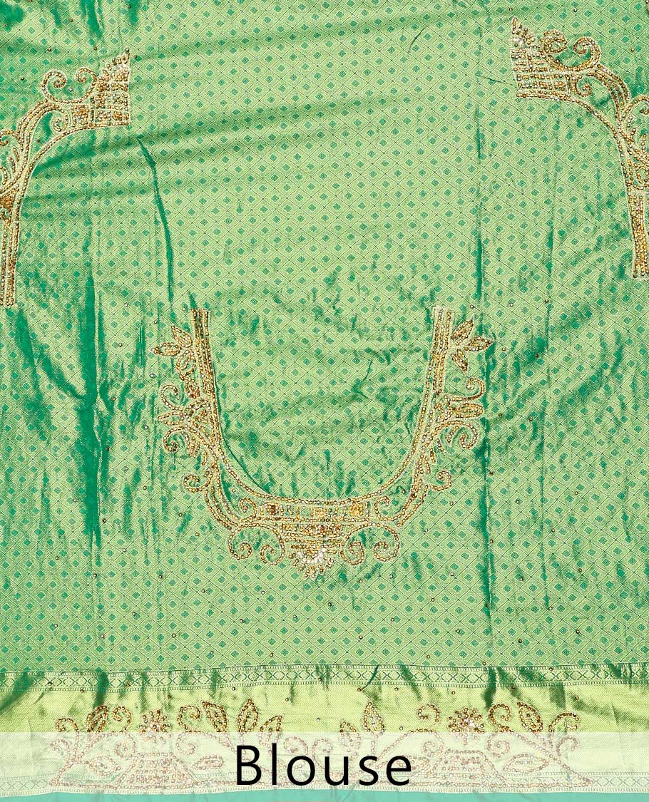 Green ogee jacquard silk saree with stonework,contrast stone & cutwork border & stonework pallu of jaal & paisley
