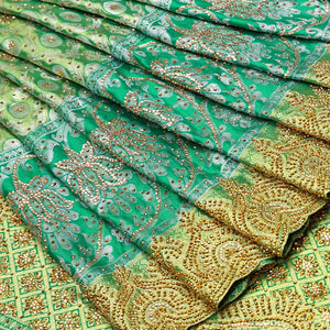 Green ogee jacquard silk saree with stonework,contrast stone & cutwork border & stonework pallu of jaal & paisley