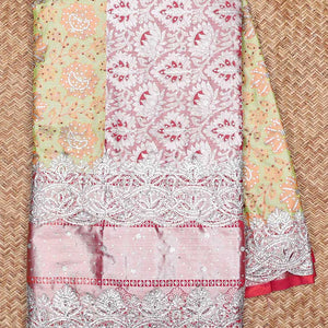 Green floral vine jacquard silksaree with stonework, contrast cutwork border & stonework pallu of intricate jaal design