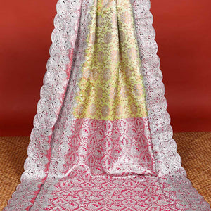 Green floral vine jacquard silksaree with stonework, contrast cutwork border & stonework pallu of intricate jaal design