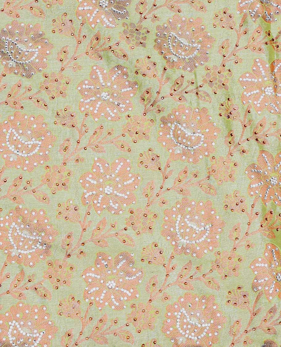Green floral vine jacquard silksaree with stonework, contrast cutwork border & stonework pallu of intricate jaal design