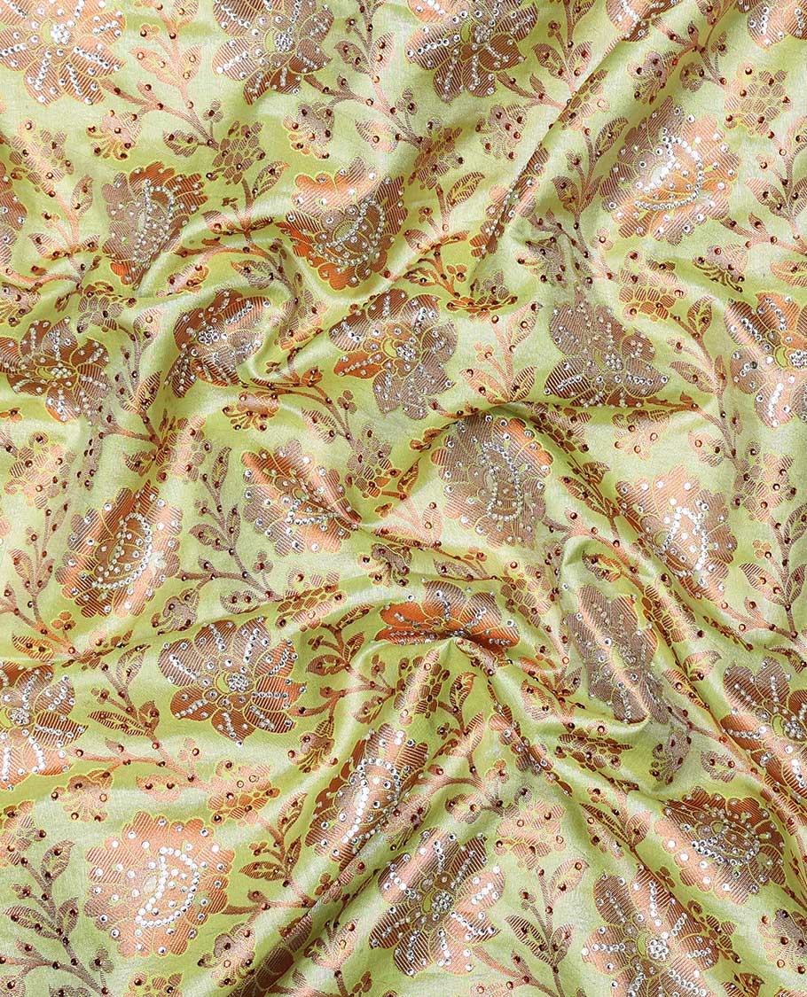 Green floral vine jacquard silksaree with stonework, contrast cutwork border & stonework pallu of intricate jaal design