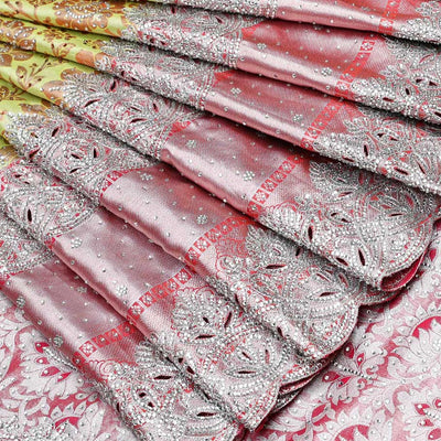 Green floral vine jacquard silksaree with stonework, contrast cutwork border & stonework pallu of intricate jaal design