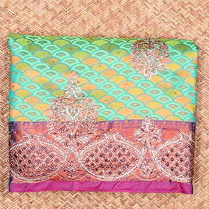 Green embossed vastrakala silksaree with ogee patterns & stonework, contrast cutwork border & intricate stonework pallu