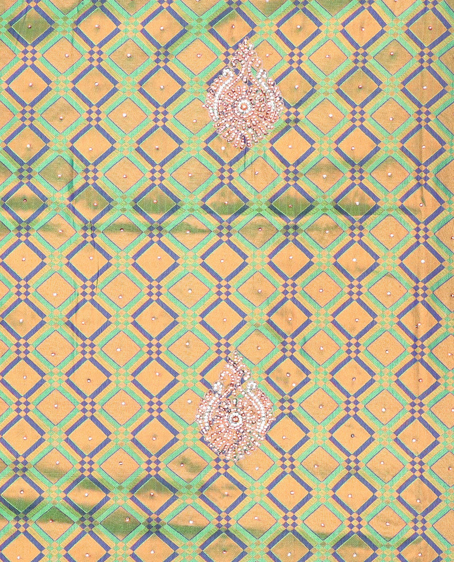 Green jacquard Vastrakala silksaree with stonework buttas, contrast cutwork border & intricate stonework pallu