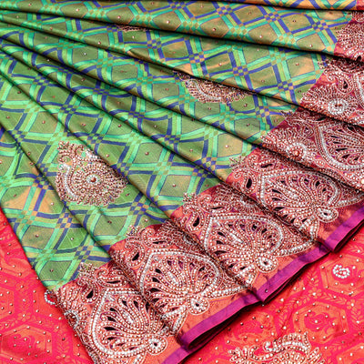 Green jacquard Vastrakala silksaree with stonework buttas, contrast cutwork border & intricate stonework pallu