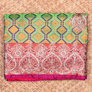 Green jacquard Vastrakala silksaree with stonework buttas, contrast cutwork border & intricate stonework pallu