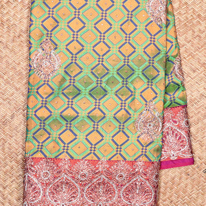 Green jacquard Vastrakala silksaree with stonework buttas, contrast cutwork border & intricate stonework pallu