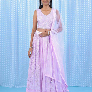 Pale pink georgette readymade lehenga with chamki,mirror,sugar bead & stone embroidery V-neck crop top & intricate skirt