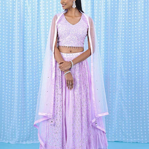 Pale pink georgette readymade lehenga with chamki,mirror,sugar bead & stone embroidery V-neck crop top & intricate skirt