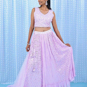 Pale pink georgette readymade lehenga with chamki,mirror,sugar bead & stone embroidery V-neck crop top & intricate skirt