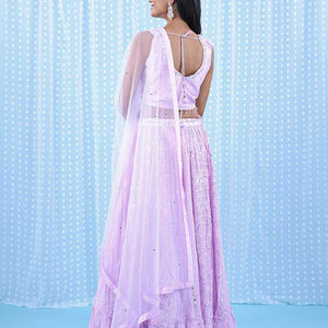 Pale pink georgette readymade lehenga with chamki,mirror,sugar bead & stone embroidery V-neck crop top & intricate skirt