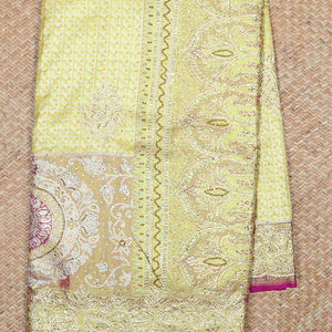 Lemon yellow jacquard & stonework vastrakala silksaree, contrast zari & stonework border & intricate stonework pallu