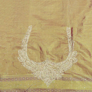 Lemon yellow jacquard & stonework vastrakala silksaree, contrast zari & stonework border & intricate stonework pallu