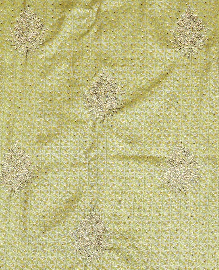 Lemon yellow jacquard & stonework vastrakala silksaree, contrast zari & stonework border & intricate stonework pallu