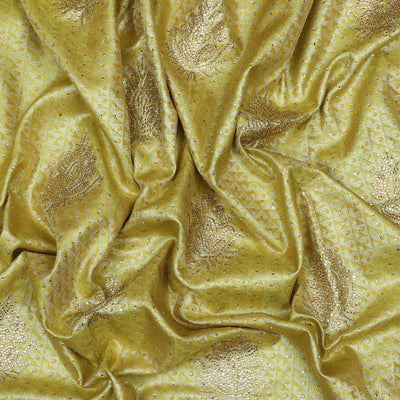 Lemon yellow jacquard & stonework vastrakala silksaree, contrast zari & stonework border & intricate stonework pallu