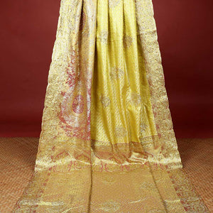 Lemon yellow jacquard & stonework vastrakala silksaree, contrast zari & stonework border & intricate stonework pallu