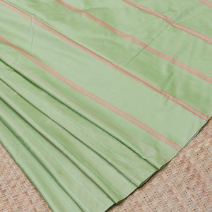 Borderless pistachio green aarani gift saree with zig-zag stripes on its body, self-pallu of stripes