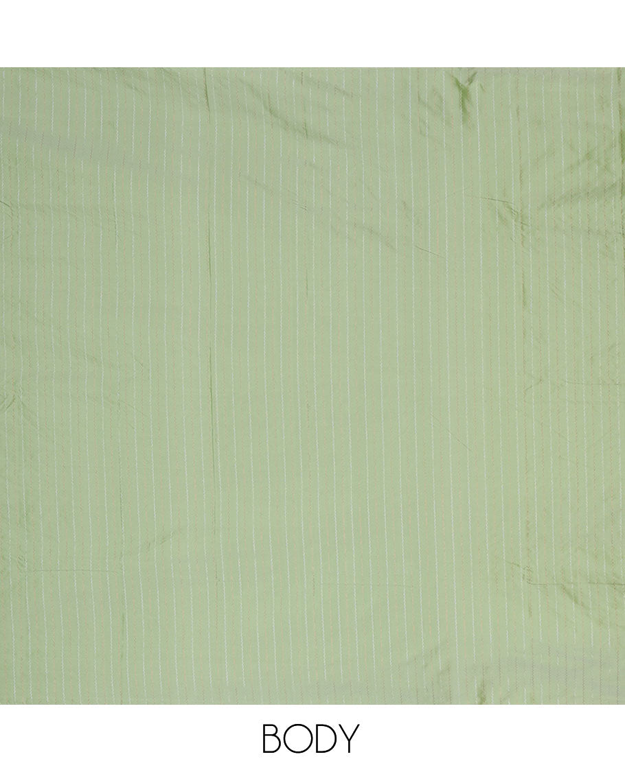 Borderless pistachio green aarani gift saree with zig-zag stripes on its body, self-pallu of stripes