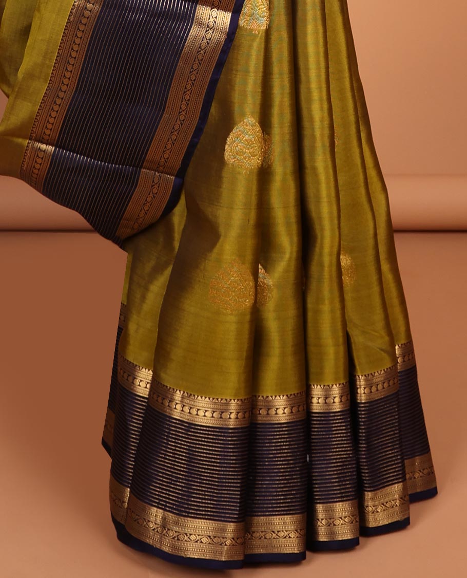 Green butta vasundhara elite silk saree with contrast zari striped border & striped, zari buttas zari design pallu