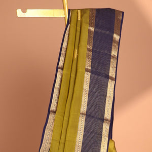 Green butta vasundhara elite silk saree with contrast zari striped border & striped, zari buttas zari design pallu