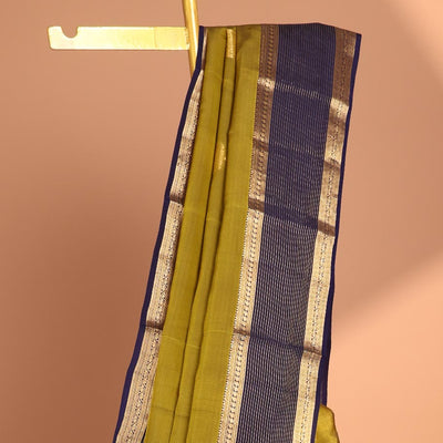 Green butta vasundhara elite silk saree with contrast zari striped border & striped, zari buttas zari design pallu