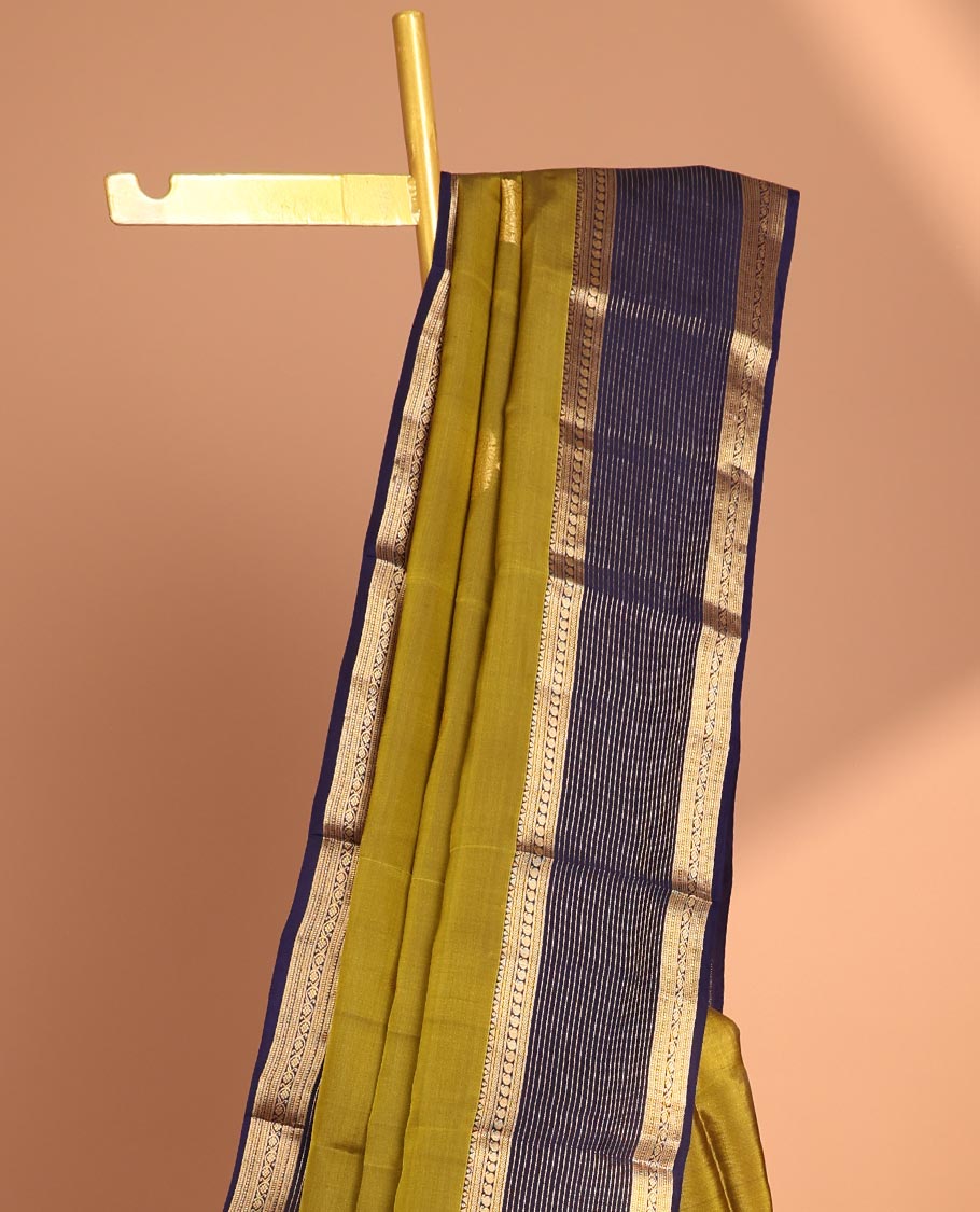 Green butta vasundhara elite silk saree with contrast zari striped border & striped, zari buttas zari design pallu