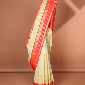 Cream floral buttas silk saree with korvai border of rekku , mayil design & intricate jaal zari design pallu