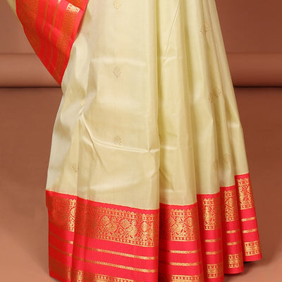 Cream floral buttas silk saree with korvai border of rekku , mayil design & intricate jaal zari design pallu